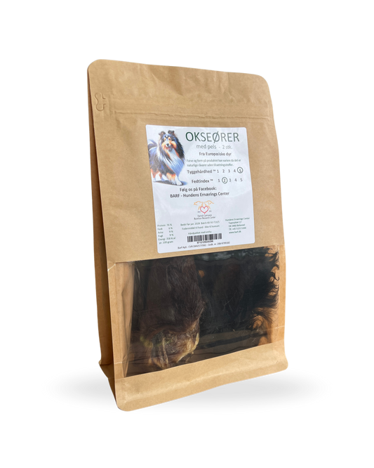Tygg av okseører med pels